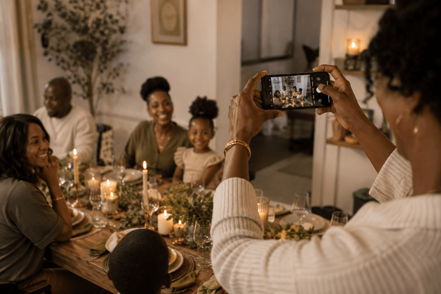 Friends gathered around a warm, lived-in home table
